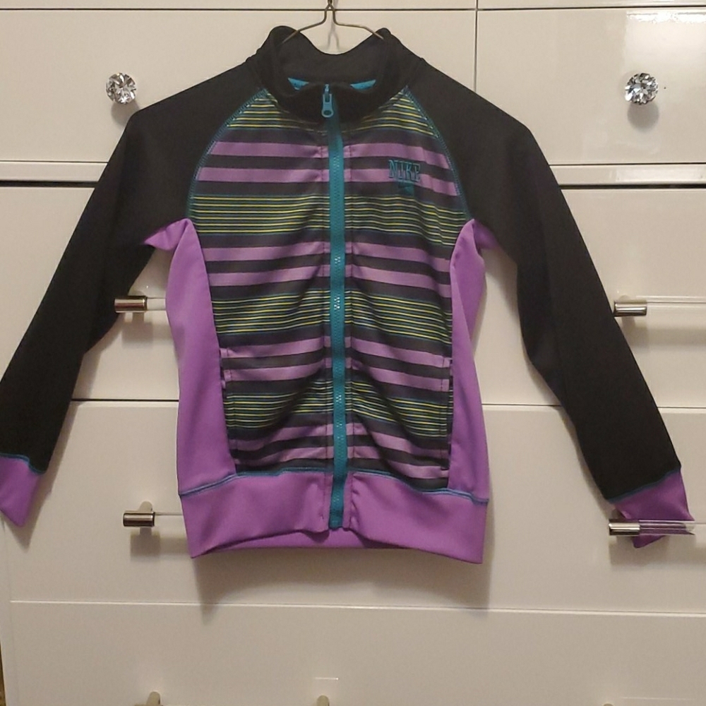 Colorful zip up jacket.